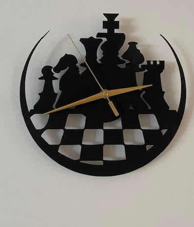 Wall clock with chess piece design on a white background