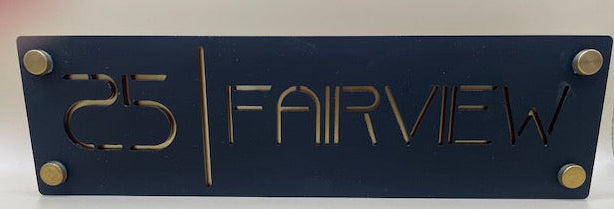 Decorative sign with '25 Fairview' text on a blue background