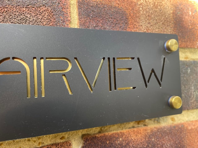 Metal sign with 'AIRVIEW' engraved on a textured background