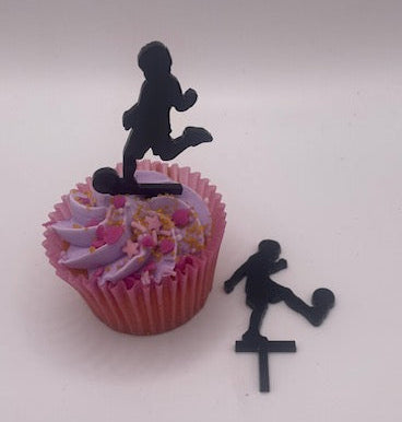 Cupcake with pink wrapper and colorful sprinkles, topped with a black running figure, on a white background.